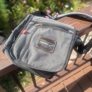 Grey canvas messenger style bag